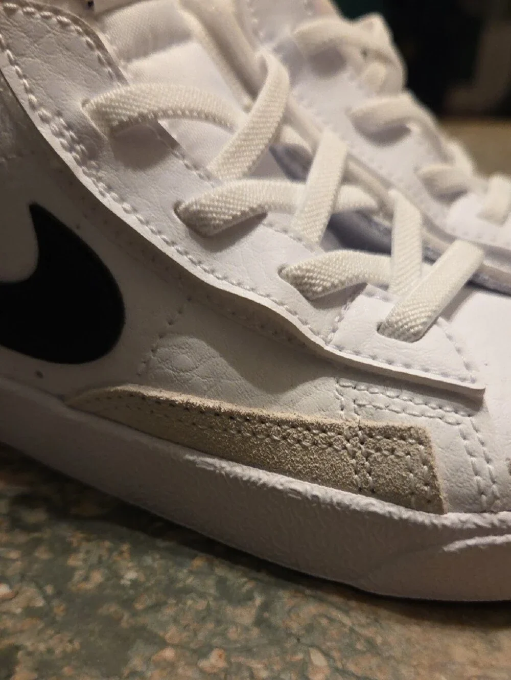 Nike Kids White High-Top Sneakers with Black Swoosh